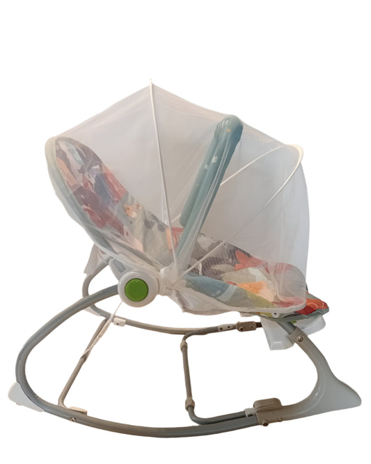 Baby bouncer with canopy on a wooden floor against a white wall
