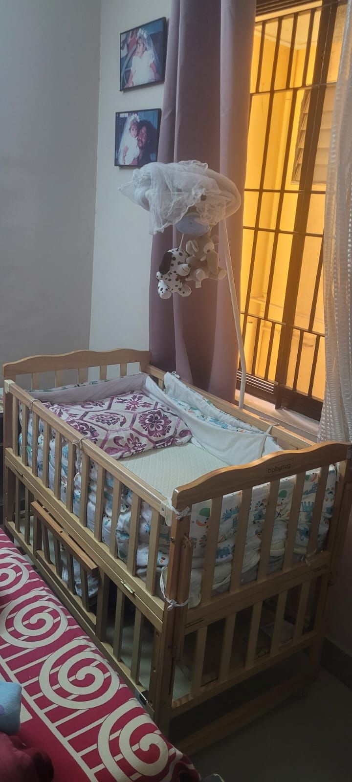 Babyhug Montana wooden cot cum rocker with mosquito net