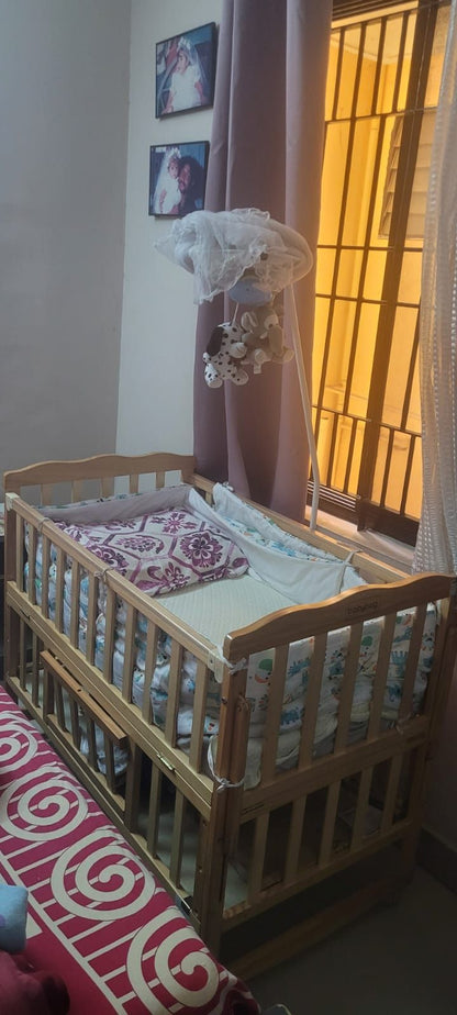 Babyhug Montana wooden cot cum rocker with mosquito net