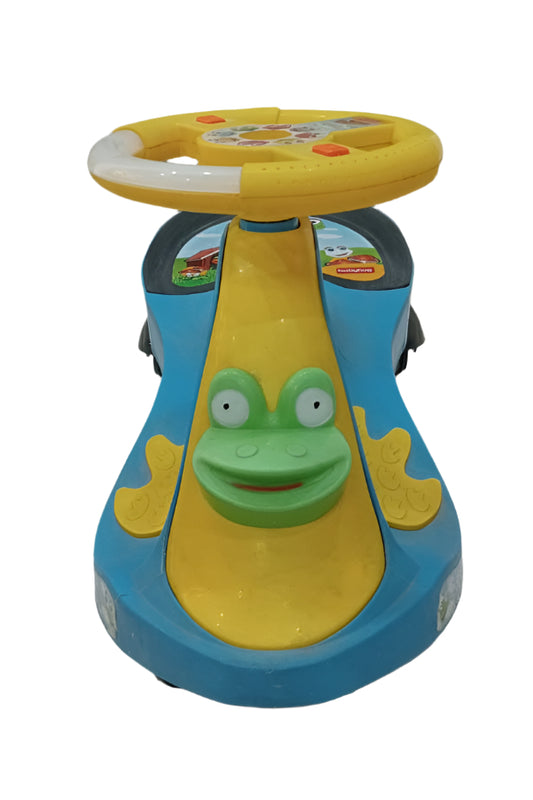 Children's toy car with a frog design on a marble floor.